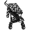A black and white zigzag patterned stroller is shown from the side against a white background. Náhled obrázku produktu