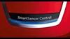 A close-up of a red appliance with a black panel displaying the text "SmartSensor Control" and a blue light. Anteprima dell’immagine prodotto