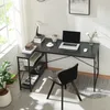 A home office setup with a desk, chair, and various office supplies. Náhled obrázku produktu