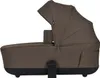 A side view of a brown baby bassinet on a white background. Náhled obrázku produktu