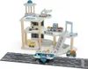 A wooden toy airport playset with various accessories. Voir les images du produit
