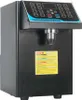 A black fructose quantitative machine with a control panel and a dispensing nozzle. Náhled obrázku produktu