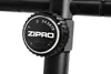 A close-up of a tension control knob on a piece of exercise equipment. Produktbild-Vorschau