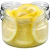Several glass jars filled with lemon slices and liquid, with two empty jars in the background. Podgląd zdjęcia produktu