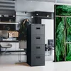 A filing cabinet in a modern office setting with plants. Náhled obrázku produktu