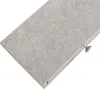 A close-up, angled view of a single shelf with a concrete-like texture and a silver knob on the side. Voir les images du produit