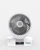 A white personal desk fan with a distinctive swirl pattern on the fan blades is centered against a plain white background. Anteprima dell’immagine prodotto