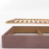 A close-up view of a bed frame and its wooden slats, shown against a white background. Náhľad obrázku produktu