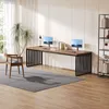 A modern home office setup with a long desk, chairs, and a bookshelf. Produktbild-Vorschau