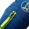 Close-up of a blue glove with a green zipper and a silver logo. Produktbild-Vorschau