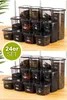 Two rows of clear plastic food storage containers filled with various dry goods, arranged on a wooden surface. Náhľad obrázku produktu