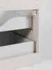 Close-up view of the interior of a cabinet with two drawers partially open, showing drawer slides and the construction of the drawers. Produktbild-Vorschau