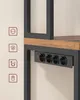 Close-up of a black power strip with four outlets and a red switch, mounted under a wooden shelf with a black metal frame. Náhled obrázku produktu