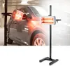 A car is being dried by infrared lamps on a stand. Anteprima dell’immagine prodotto