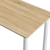A close-up view of a light brown wooden tabletop with white legs of a table. Náhled obrázku produktu