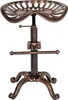 A bronze tractor seat bar stool on a white background. Náhľad obrázku produktu