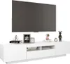 A white TV stand with a large TV mounted above it, and various decorative items placed on the stand. Produktbild-Vorschau