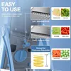 A close-up view of a blue and gray vegetable slicer with instructional graphics and text. Voir les images du produit