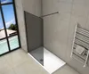 A modern bathroom with a walk-in shower, a window with a tropical view, and a heated towel rack. Produktbild-Vorschau