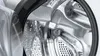 A close-up view of the inside of a washing machine drum. Produktbild-Vorschau