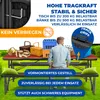 A picnic set with a table and benches set up outdoors on grass, with various items on the table. Produktbild-Vorschau