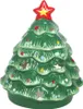 A ceramic Christmas tree-shaped oil burner. Voir les images du produit