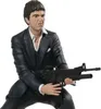 A statue of a man holding a gun. Podgląd zdjęcia produktu