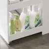 SoBuy Waschmaschinenunterschrank BZR229-W: Unterer Fachbereich mit Flaschen Waschmittel und Reiniger Productafbeelding-voorbeeld