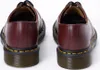 Rear view of two cherry red leather shoes on a white background. Produktbild-Vorschau