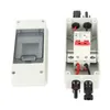 A white electrical distribution box, open to reveal internal components, and its separate lid, set against a white background. Náhled obrázku produktu