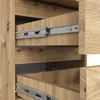 Close-up view of wooden drawers with metal drawer slides. Produktbild-Vorschau