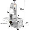 A commercial electric meat band saw machine is shown from a three-quarter front angle against a white background. Dimensions are indicated with text and lines. Anteprima dell’immagine prodotto
