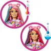 Two images of a Barbie doll with color-changing hair, one showing the hair in warm tones and the other in cool tones, with thermometers indicating temperature changes. Produktbild-Vorschau