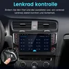The image shows a car's dashboard with a touchscreen display and a close-up of a hand pressing a button on the steering wheel. Produktbild-Vorschau