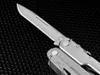 A close-up shot of a Leatherman multi-tool, focusing on the knife blade and part of the handle. Produktbild-Vorschau
