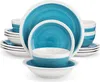 A stack of blue and white ceramic plates and bowls. Produktbild-Vorschau