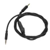 A black headset cable with two 3.5mm jack connectors and an inline control module, laid out on a white background. Podgląd zdjęcia produktu
