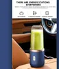 A portable blender filled with a green smoothie sits on a car seat. Podgląd zdjęcia produktu