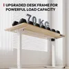 A standing desk with dumbbells on top, demonstrating its load capacity. Voir les images du produit