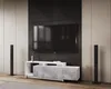 A modern living room setup featuring a TV stand with a television, speakers, and decorative elements. Náhled obrázku produktu