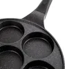 Close-up view of a multi-cup frying pan. Náhled obrázku produktu