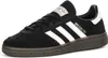 A single black Adidas Handball Spezial J sneaker is shown from a side-angle on a white background. Voir les images du produit