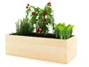 A wooden raised garden bed filled with various plants, including tomatoes, herbs, and leafy greens, set against a white background. Produktbild-Vorschau