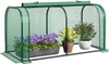 A mini greenhouse with plants inside, displayed on a white background. Podgląd zdjęcia produktu