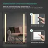 An image showing how to turn on a mirror using a wall switch, with a diagram and text. Produktbild-Vorschau