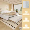 A white daybed with a pull-out trundle bed in a bedroom setting. Náhled obrázku produktu