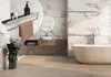 A modern bathroom with marble-effect tiles, a bathtub, a sink, and a shelf with a towel and toiletries. Anteprima dell’immagine prodotto