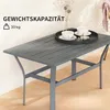 A dark gray metal side table with a slatted top, set on a tiled patio. Two cups of coffee and some biscuits are on a black tray on the table. Náhled obrázku produktu
