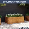 Two wooden planter boxes filled with plants are shown in an outdoor setting with a dark wooden fence behind them and gravel on the ground. Produktbild-Vorschau
