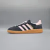 A side view of a single Adidas sneaker against a plain gray background. Produktbild-Vorschau